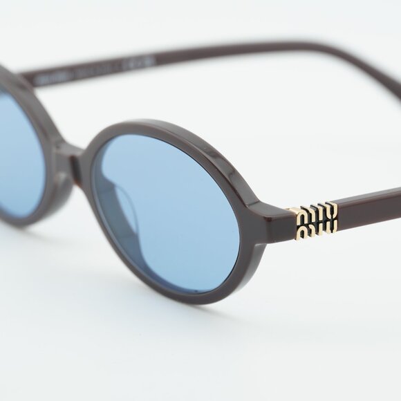 Miu Miu MU04ZS 22C60O Sunglasses Moka Oval Frame, Light Blue Lenses main image 8